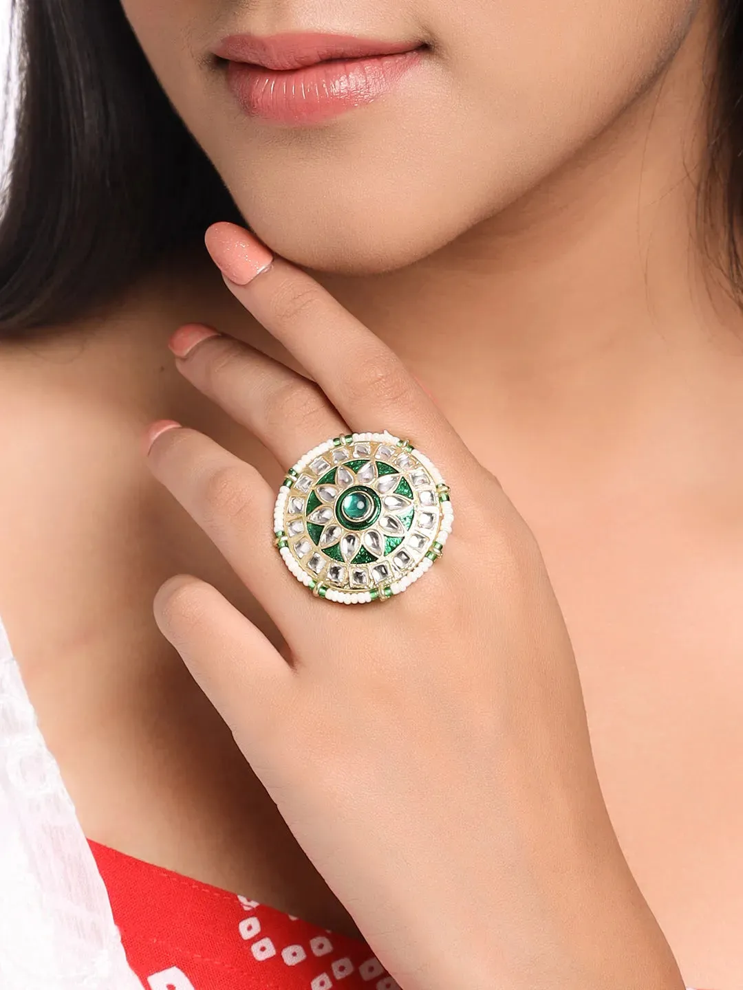 Gold plated green and white Kandan stone studded minakari adjustable finger ring