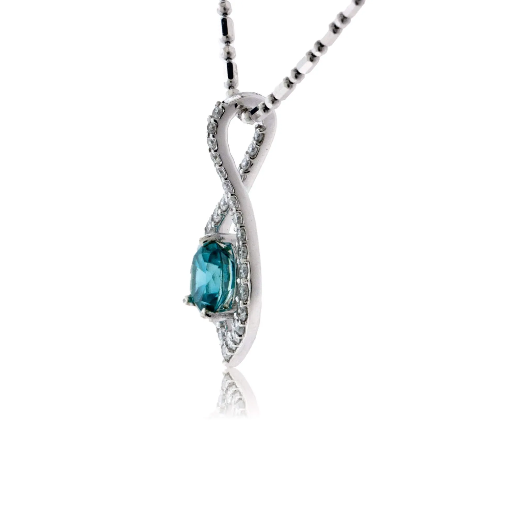 Oval Blue Zircon with Diamond Outline Pendant