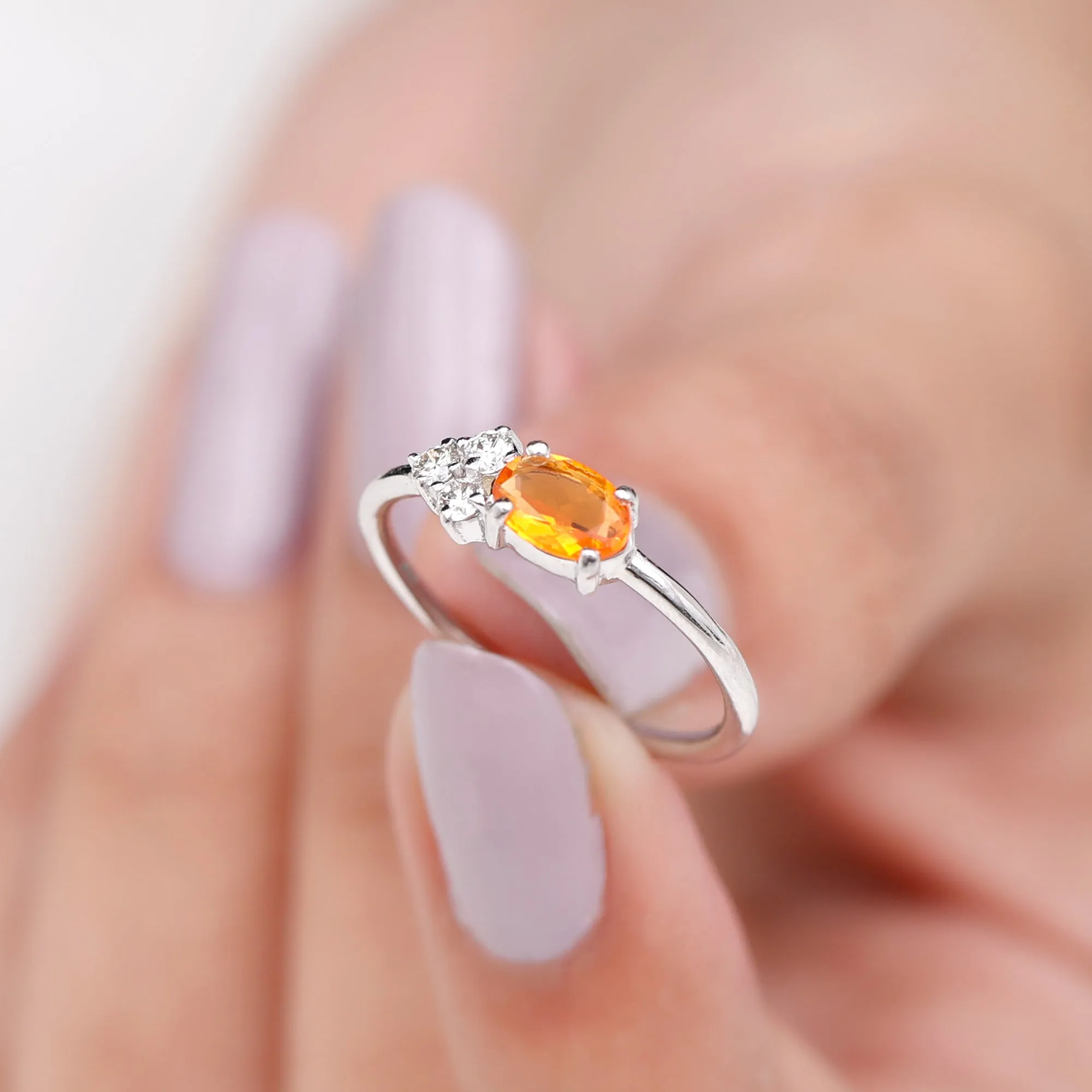 Oval Cut Fire Opal Minimal Ring with Diamond Trio