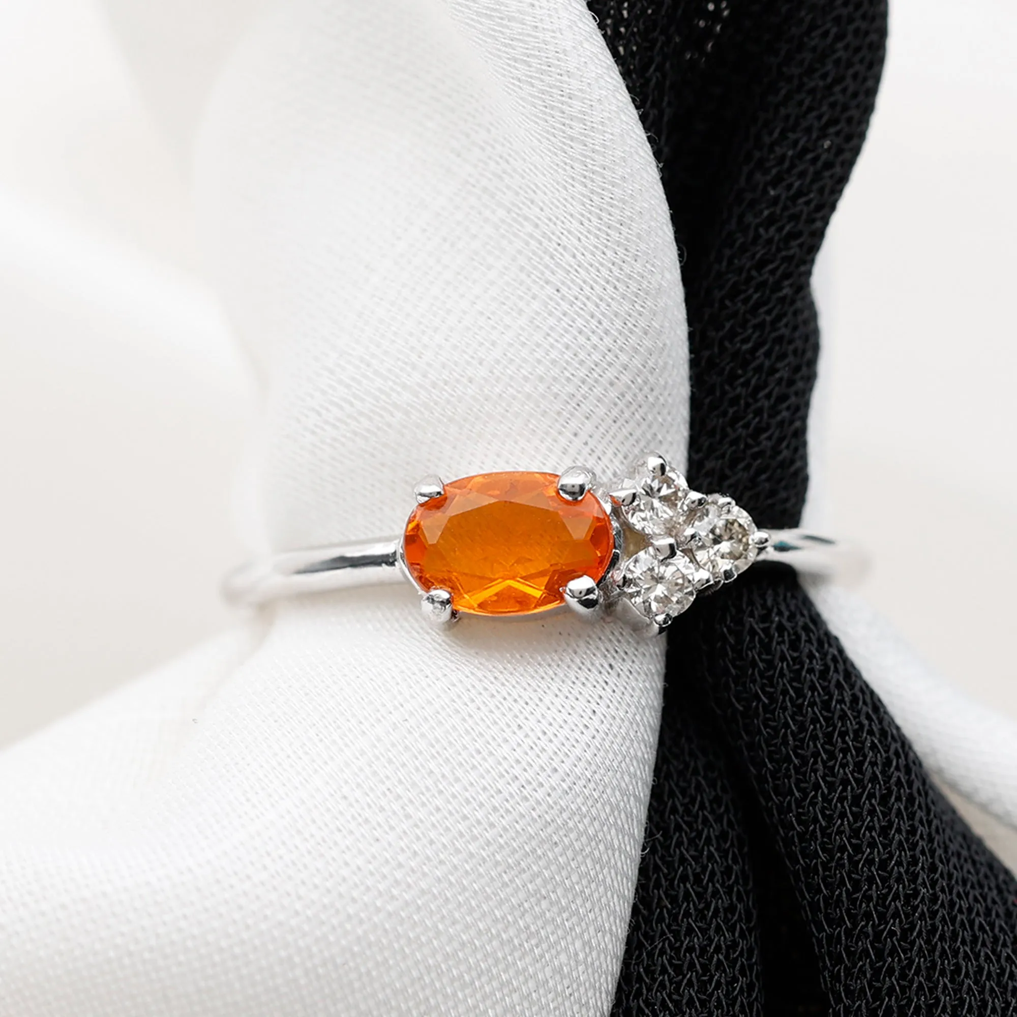 Oval Cut Fire Opal Minimal Ring with Diamond Trio